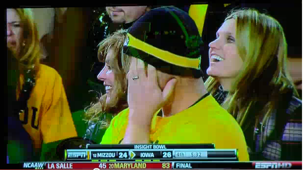 Mizzou fan hides face at Insight Bowl