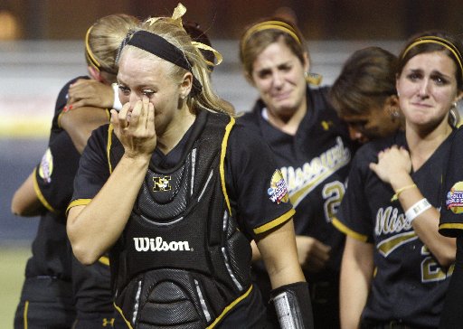 Mizzou softball players crying after a loss.