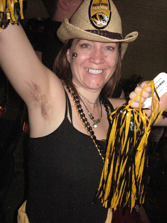 Female Mizzou fan with arm pit hair.