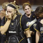 Mizzou softballs players crying after a playoff loss.