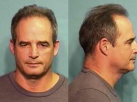 Mizzou's football coach Gary Pinkel' mug shot