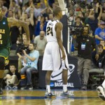 Mizzou tigers walk off the court as Norfolk St celebrates.